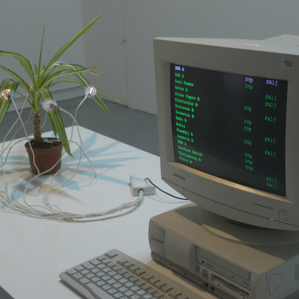 Ola Pehrson "Yucca Invest Trading Plant, 1999": Training a plant to understand the stock market. More of a conceptual joke, working with the slightly old idea of behaviorist conditioning, but maybe there is some truth to it?